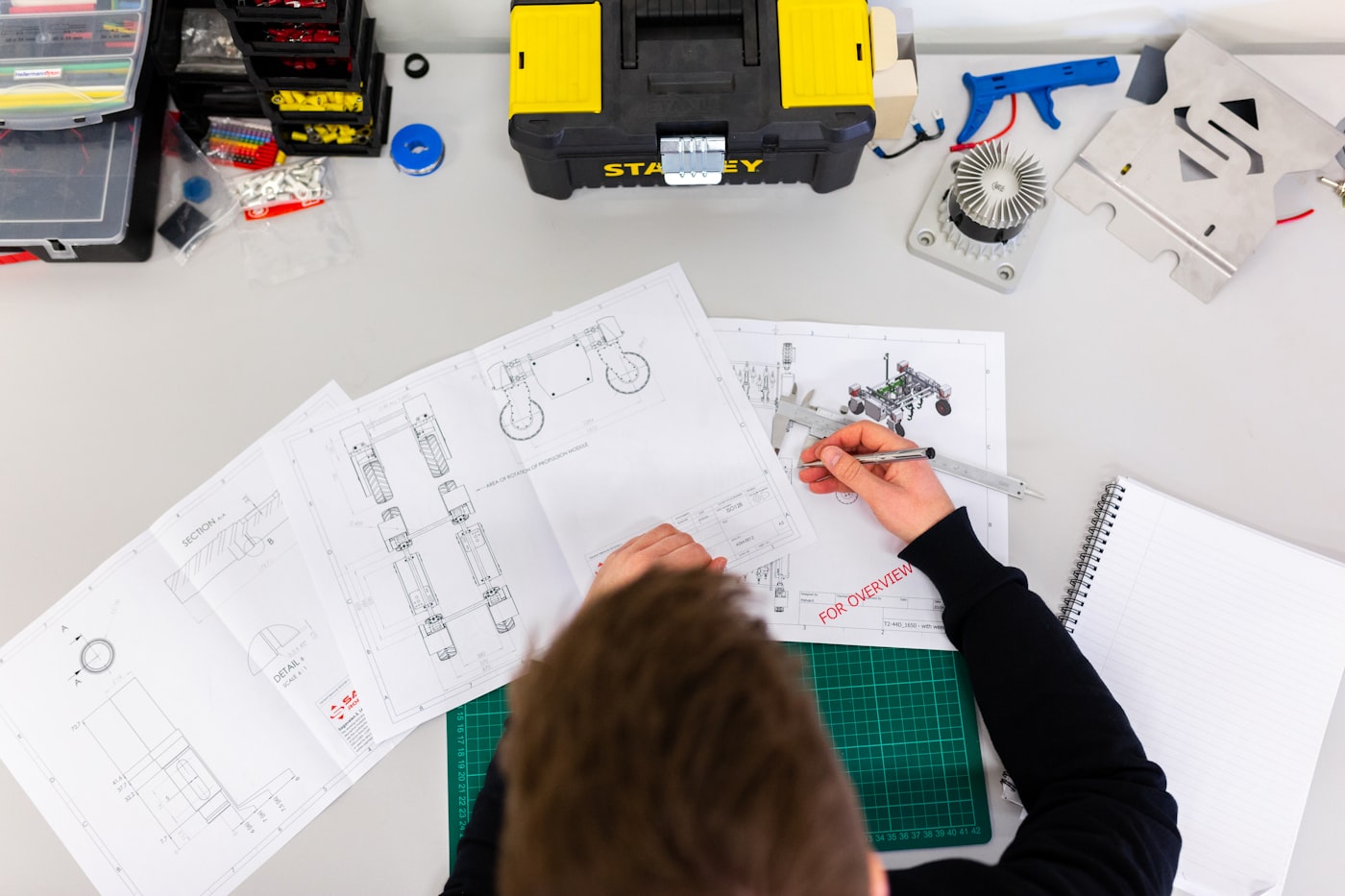 Technician working with equipment in a workshop